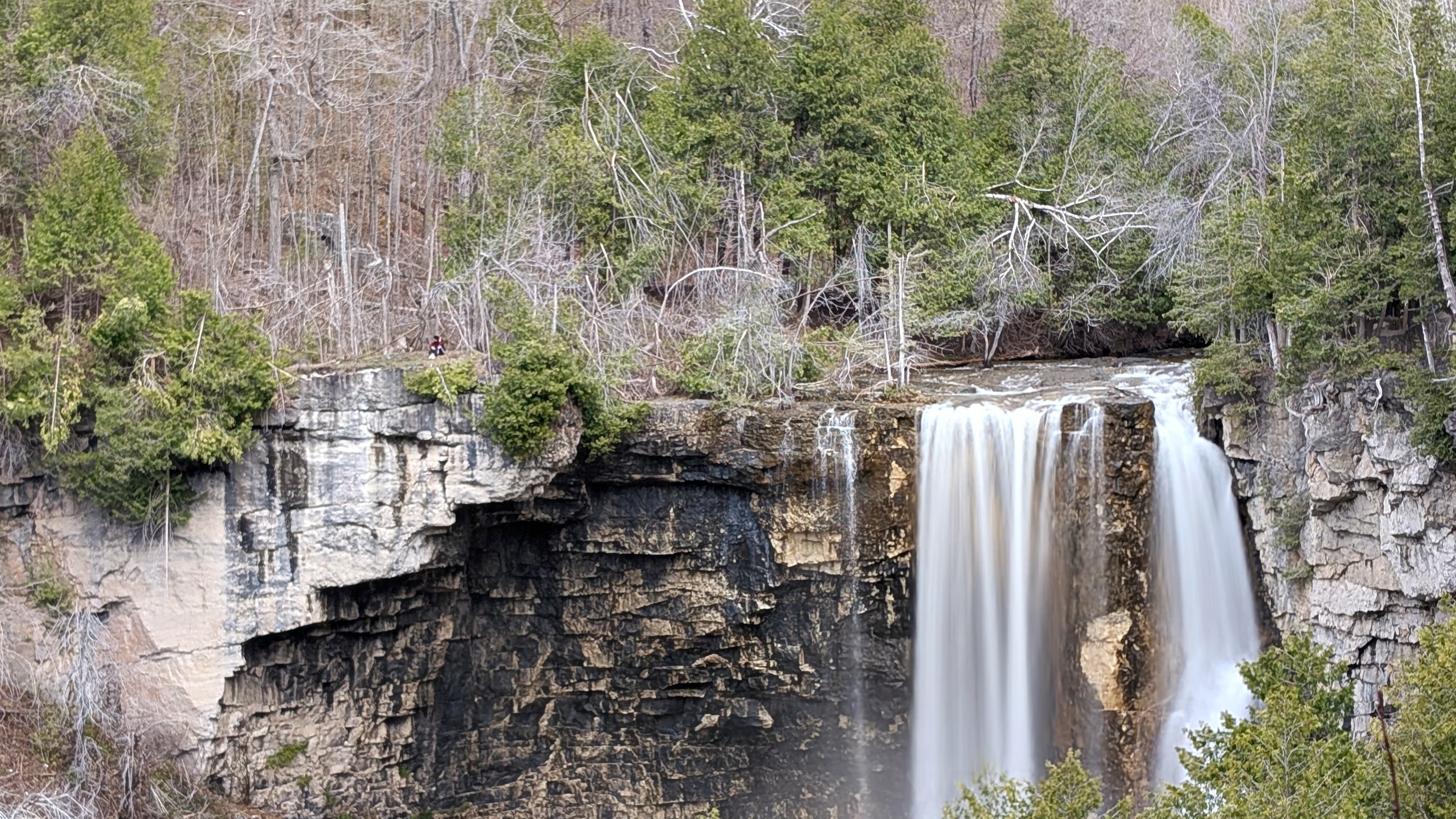 The calming presence of the silk-like Eugenia Falls contrasts with the tired, landsliding shrubbery surrounding it