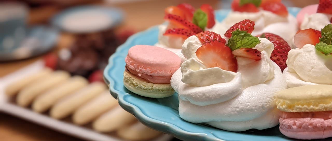 Macro shot of macarons, almond melt-away cookies, and other baking