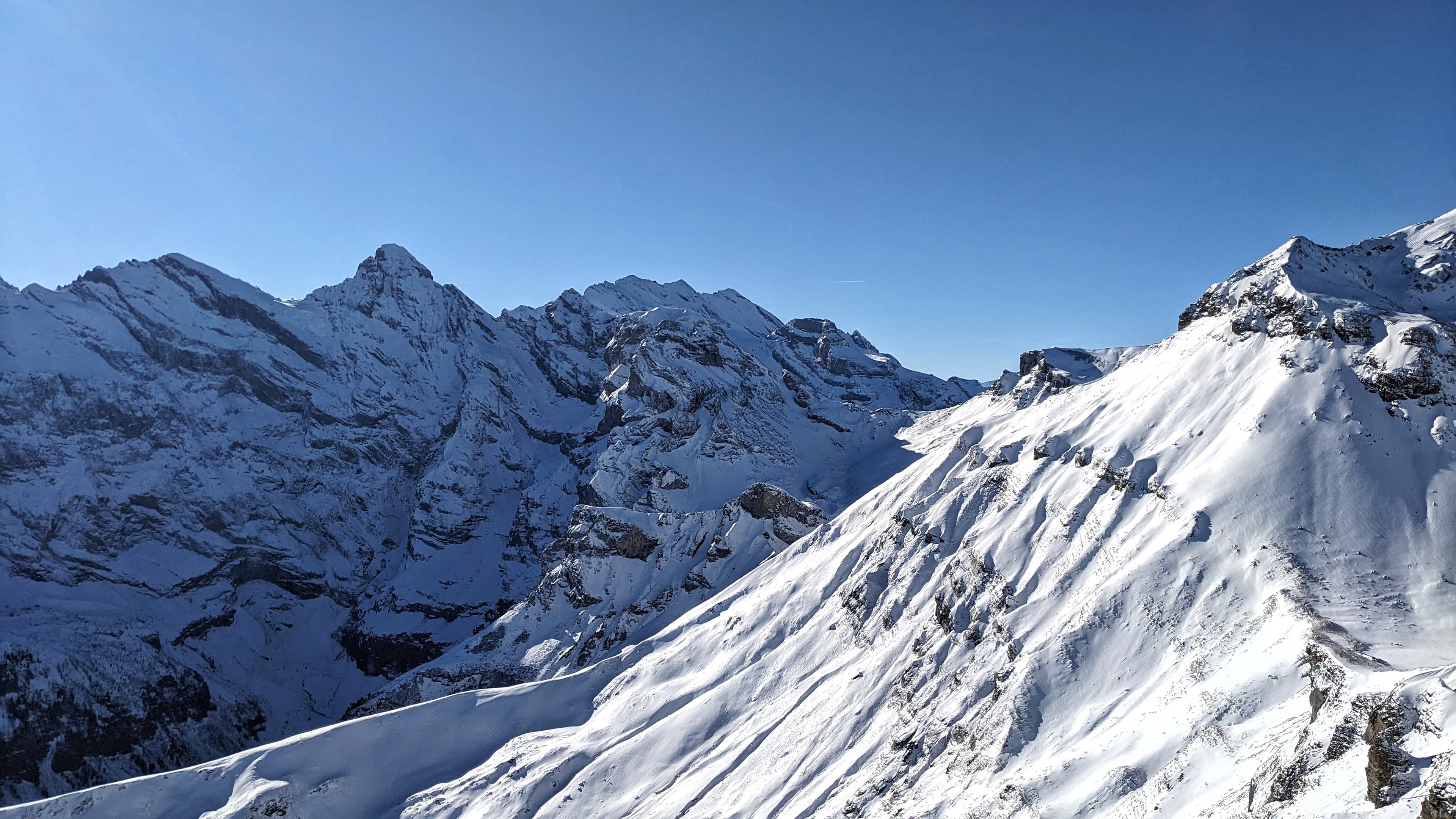Snow-capped peaks, viewed from the top of Jungfrau in the Swiss Alps at Lauterbrunnen