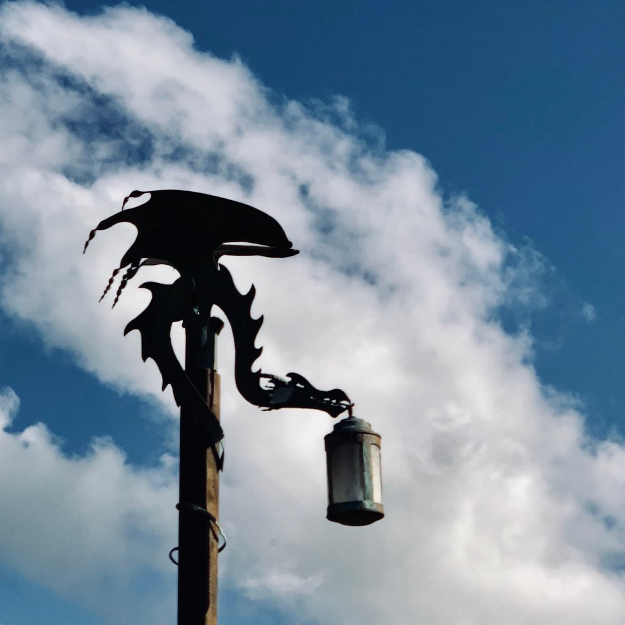 A dragon lantern stands over the original Hobbit Hills in New Zealand