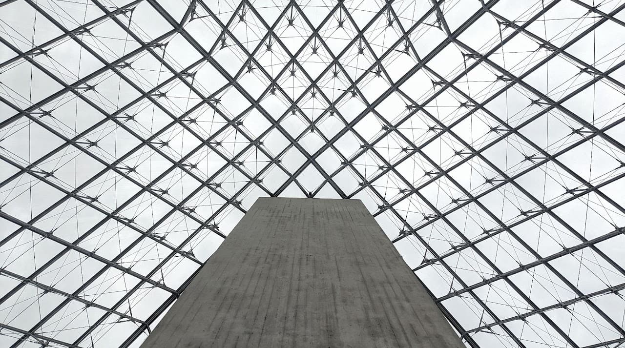 The iconic Louvre Pyramid from below