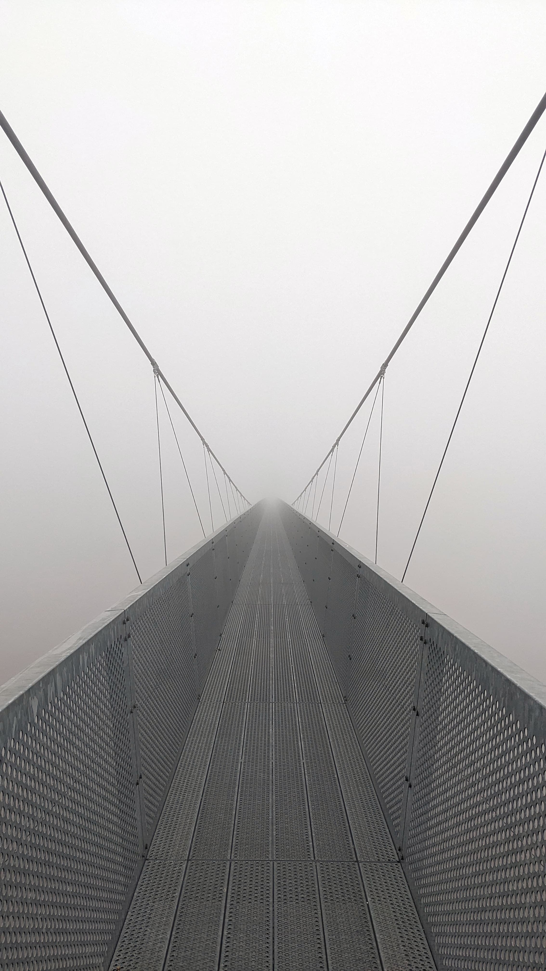 The extremely fogged Sigriswil Panorama Bridge from the show Crash Landing on You in Interlaken, Switzerland